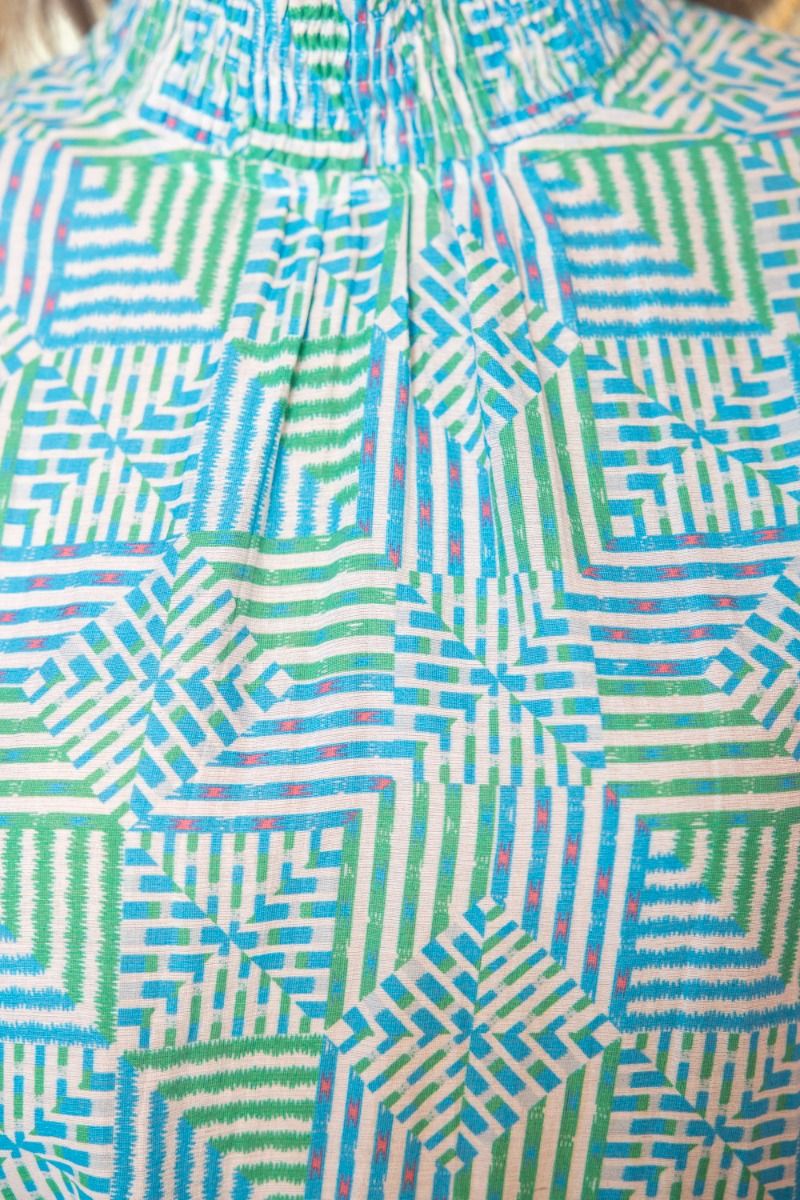 36395 Smocked Mock Neck Embroidered Sleeve Top