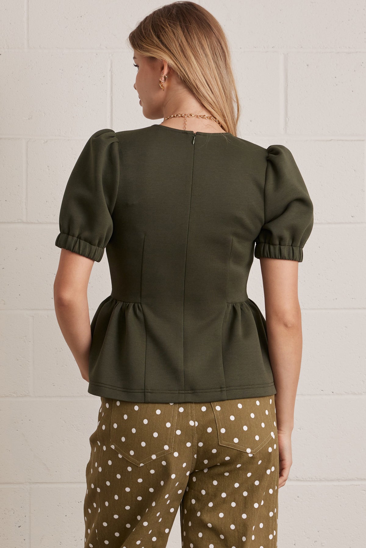 T32220 Peplum Hem Top