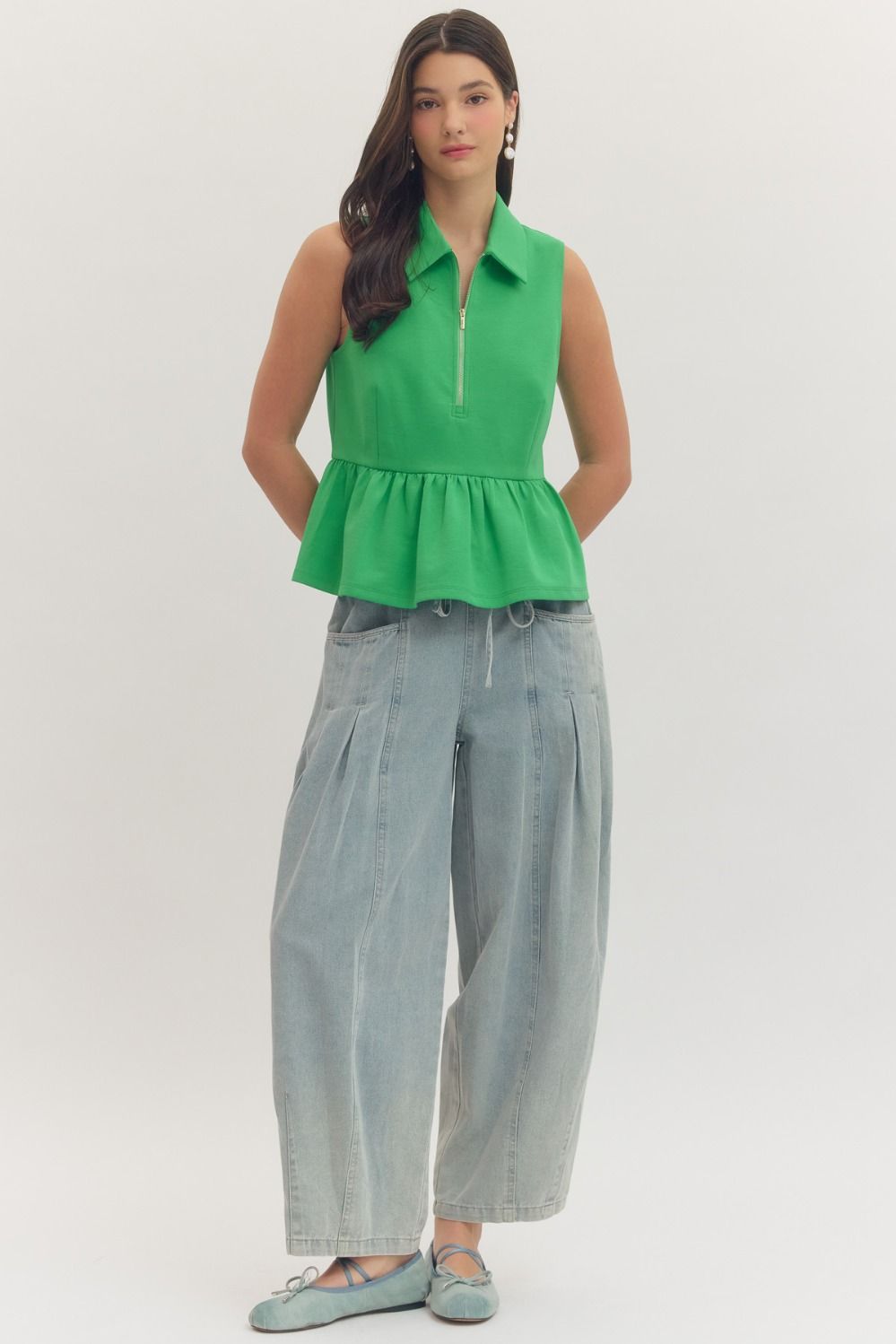 T30057 Solid Sleeveless Peplum Top