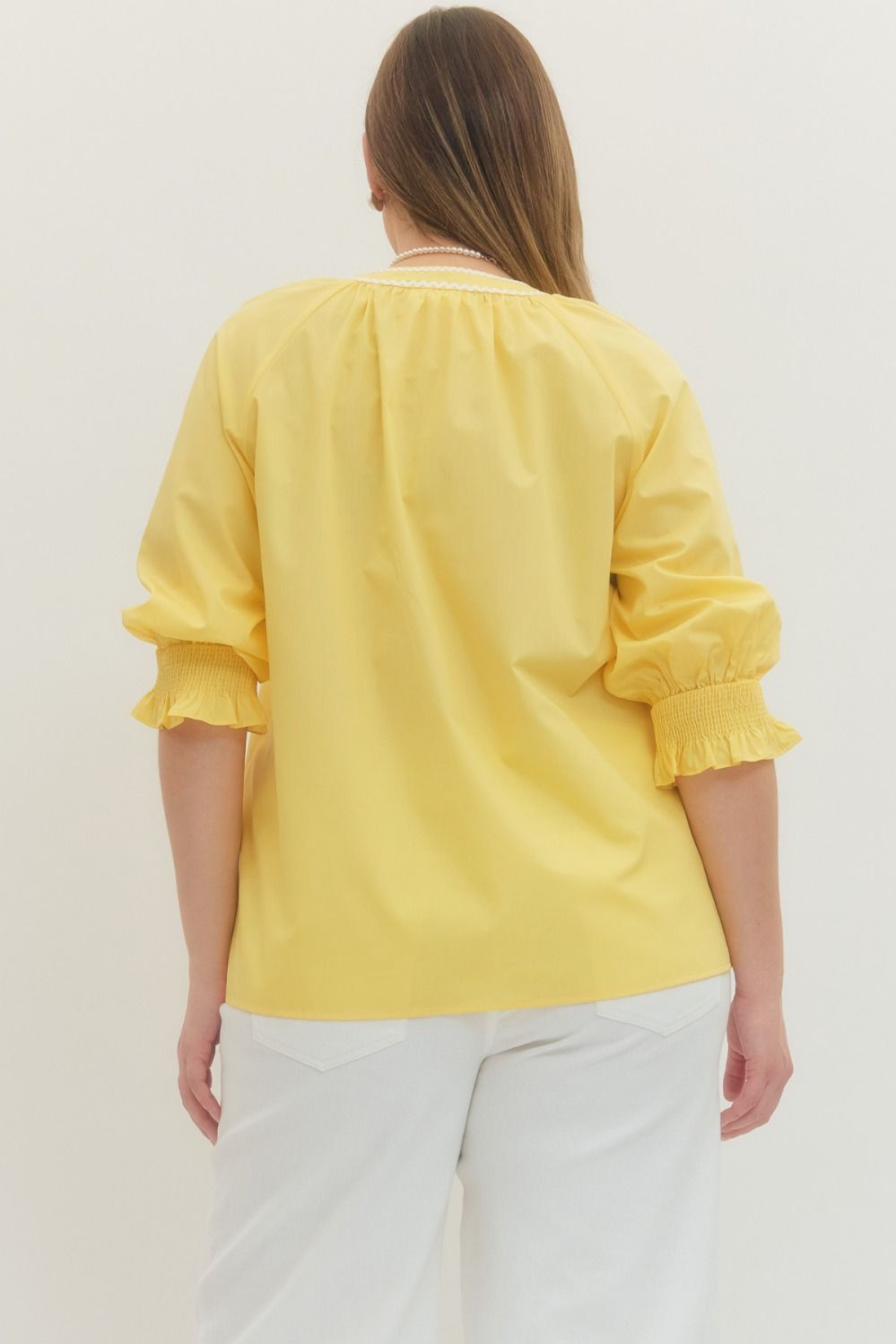 T30286P Curvy Solid Embroidered Top