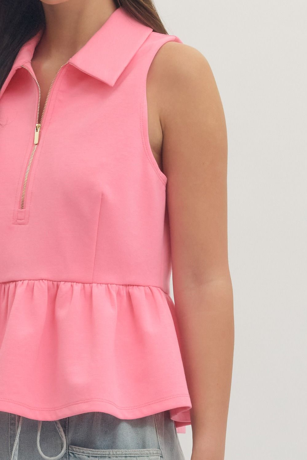 T30057 Solid Sleeveless Peplum Top