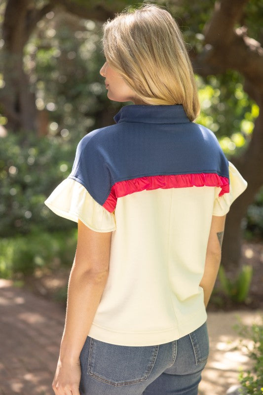 36748 Half Zip Ruffled Color Block Top