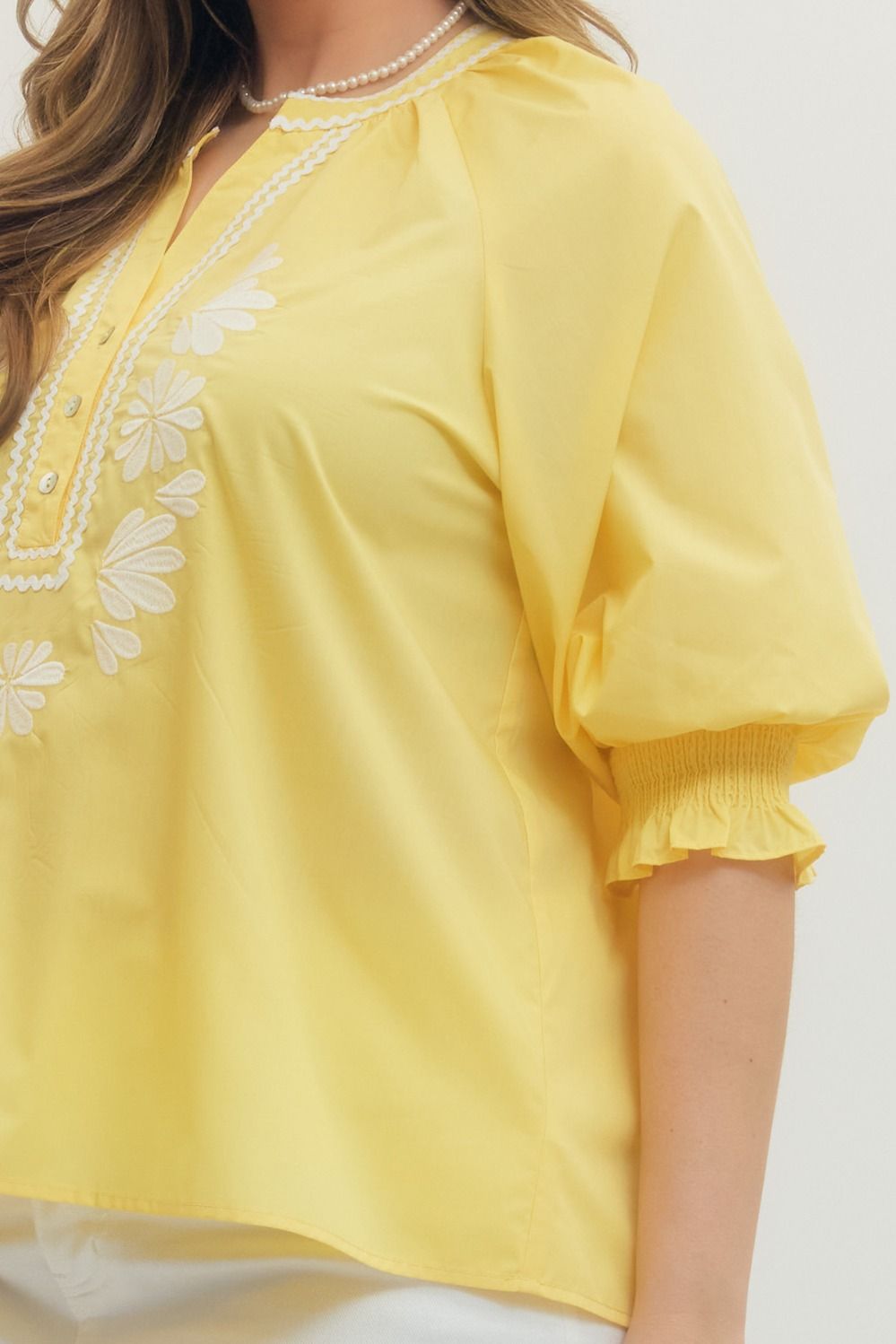 T30286P Curvy Solid Embroidered Top