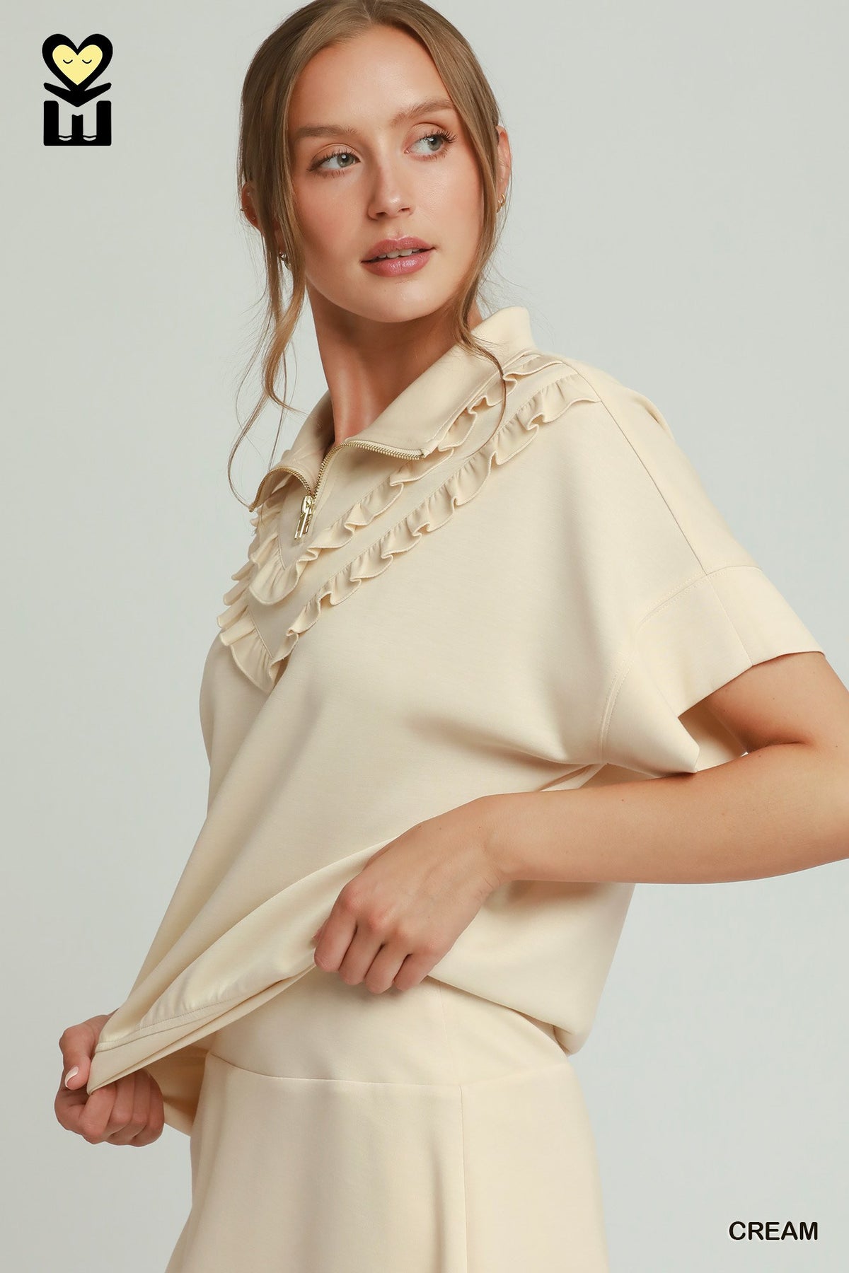 H1085-T Ruffle Quarter Zip Top