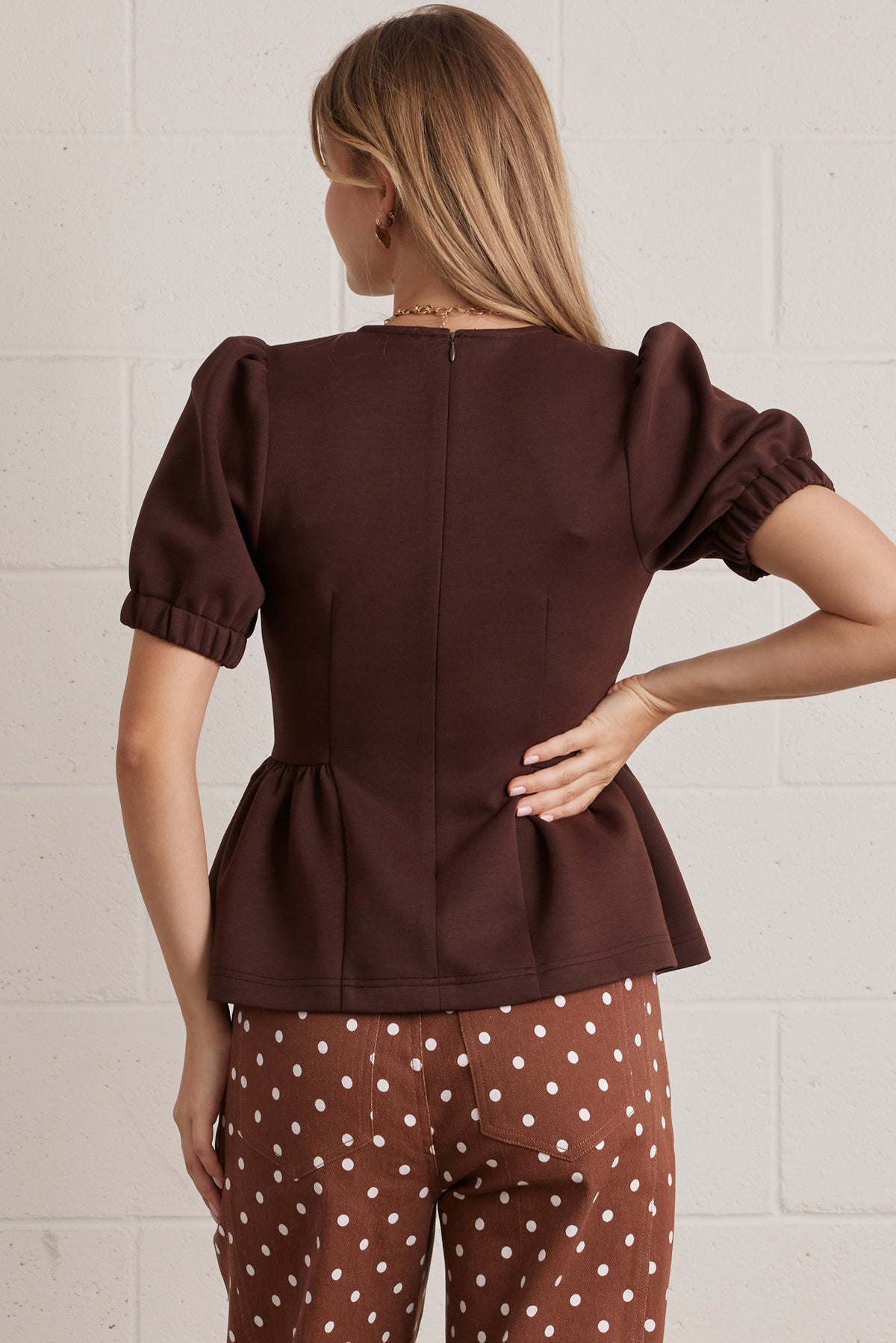 T32220 Peplum Hem Top