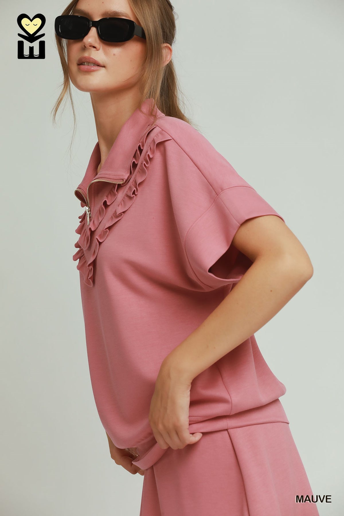 H1085-T Ruffle Quarter Zip Top